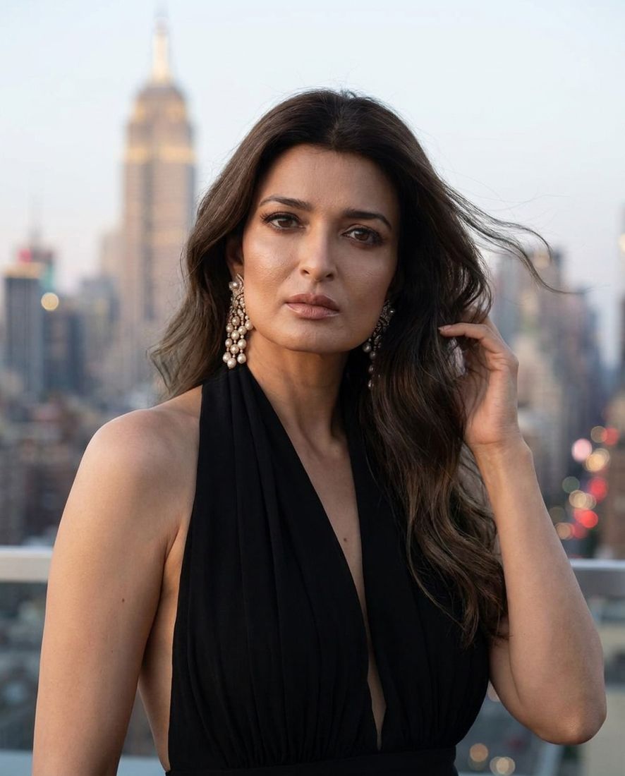 Dr. Anuragini Pandey on a Manhattan rooftop at dusk